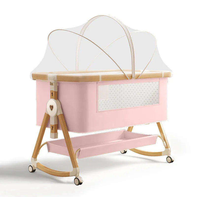 Pink baby bassinet with canopy, wooden frame, and storage tray for newborns