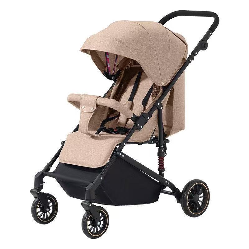 Beige lightweight baby stroller with black frame, canopy, and 3 wheels for easy travel