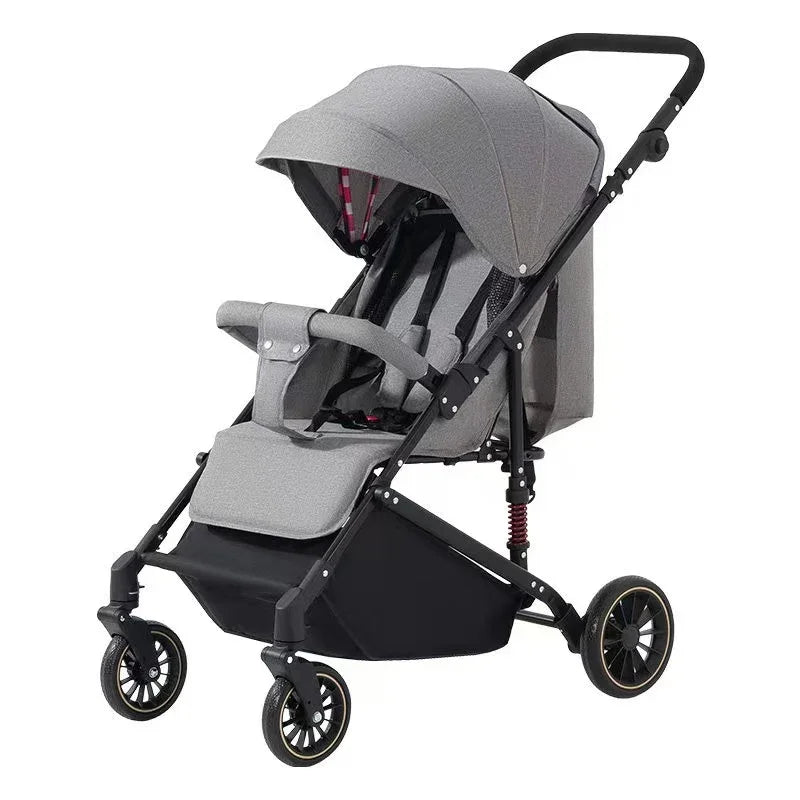 Lightweight gray baby stroller with black frame, canopy, and four wheels for easy travel